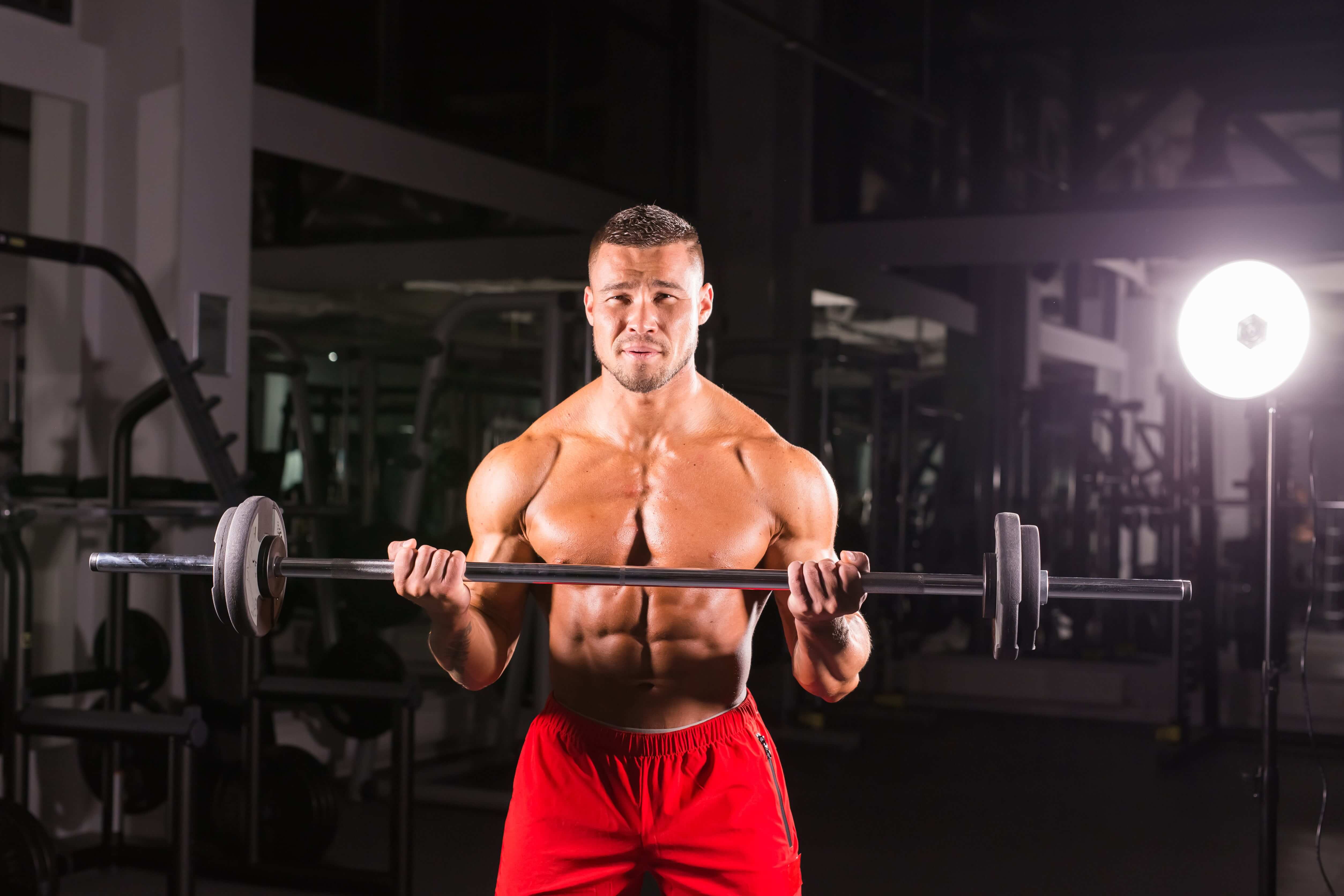 A bodybuilder lifting a bar